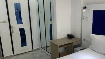 Deluxe Double Room, Balcony, City View | Desk, laptop workspace, iron/ironing board, WiFi