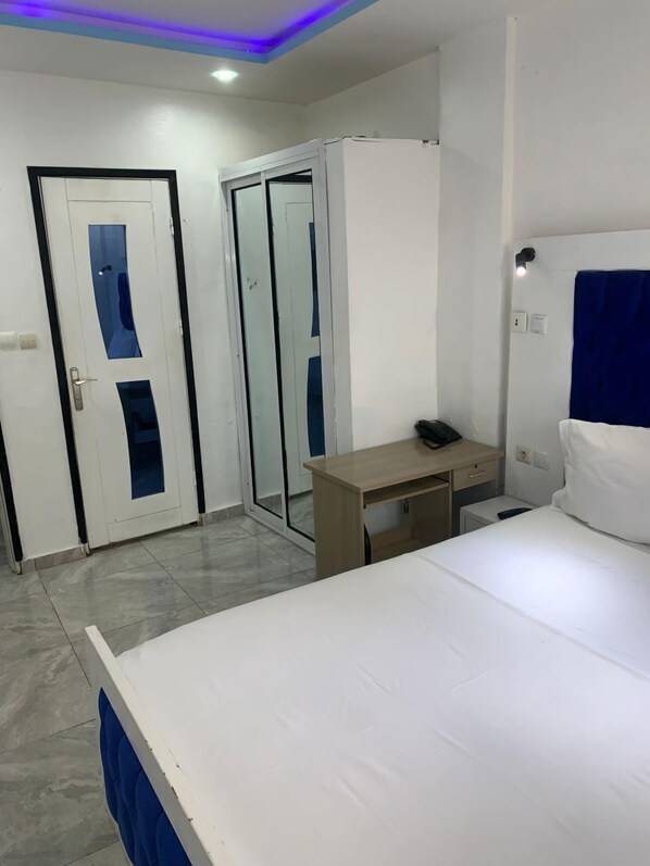 Deluxe Double Room, Balcony, City View | Desk, laptop workspace, iron/ironing board, WiFi