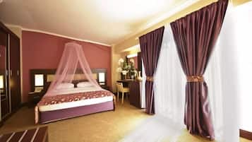 Deluxe Room | Minibar, free cots/infant beds, bed sheets, wheelchair access