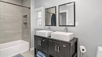 Hair dryer, towels, soap, shampoo