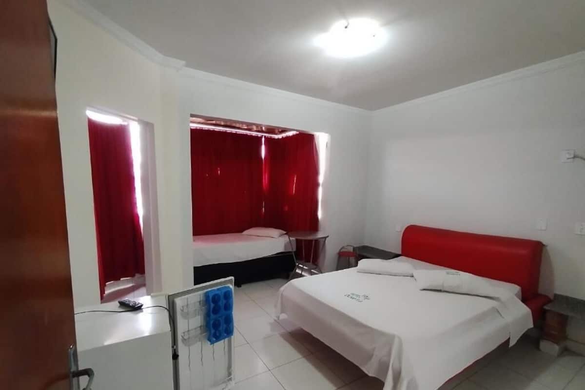 Deluxe Triple Room, City View | Desk, free WiFi
