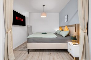 1 habitación, tabla de planchar con plancha, cuna de viaje y wifi 