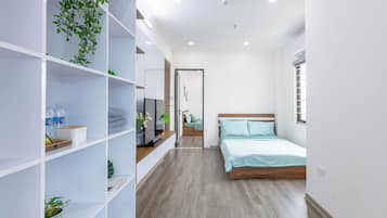 Family Apartment | Laptop workspace, blackout drapes, soundproofing, iron/ironing board