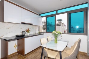 Fridge, cookware/dishes/utensils, eco-friendly cleaning products - Hera West Lake Apartment (Hanoi)