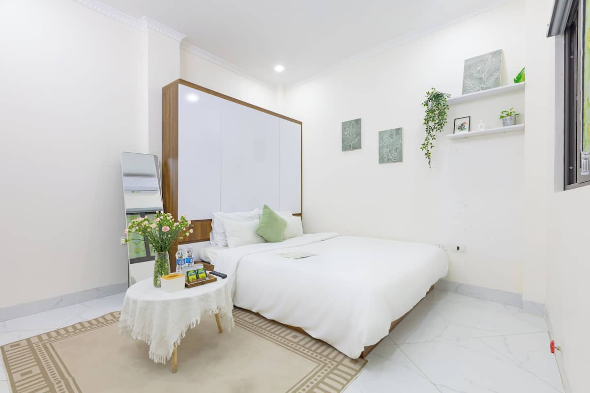 Laptop workspace, blackout curtains, soundproofing, iron/ironing board