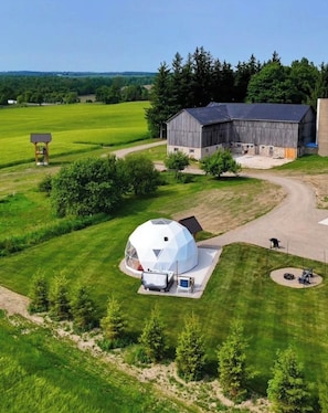 A large barn with a dome structure in a rural setting. - The Sunset Dome- a private escape, with breathtaking sunsets, rooted in nature. (Guelph/Eramosa)