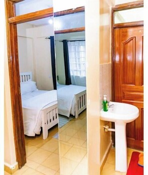 2 quartos, acesso à internet, roupa de cama