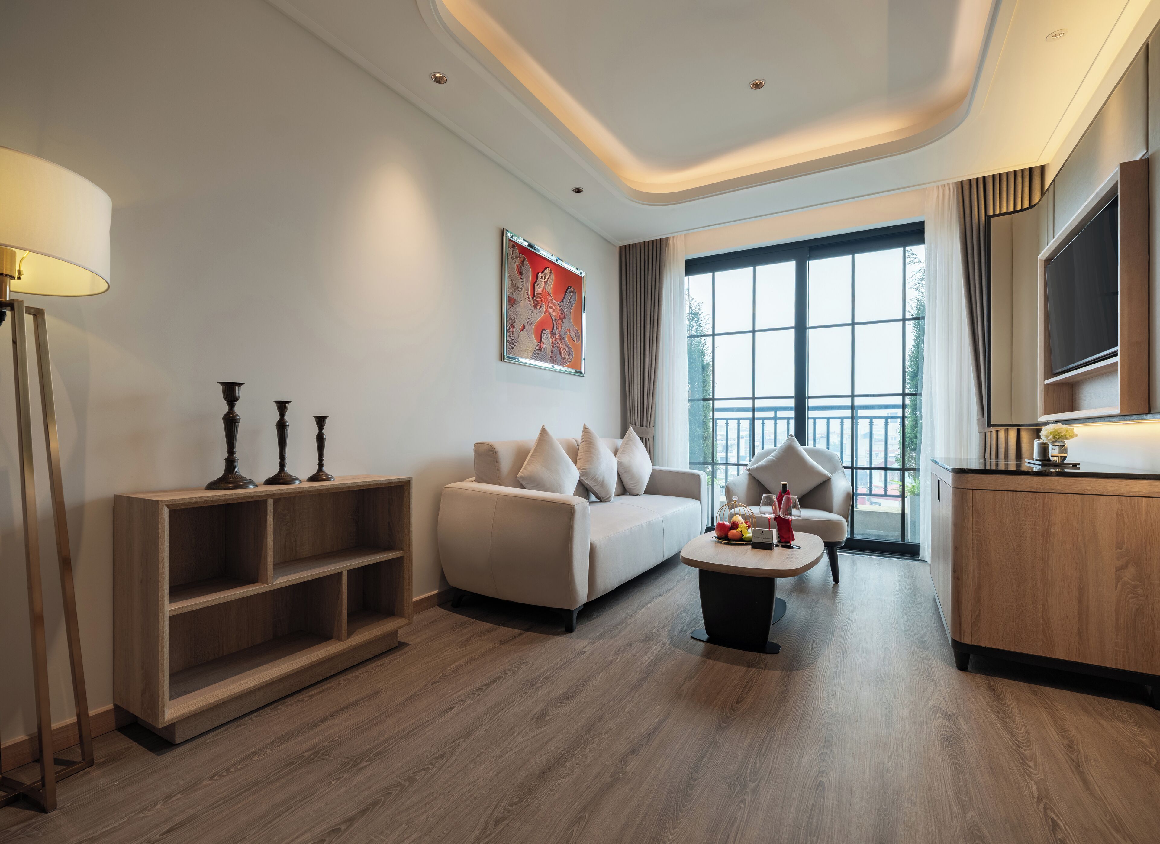 Signature La Gare Terrace Suite Railway View | Living area | 45-inch Smart TV with cable channels, printers