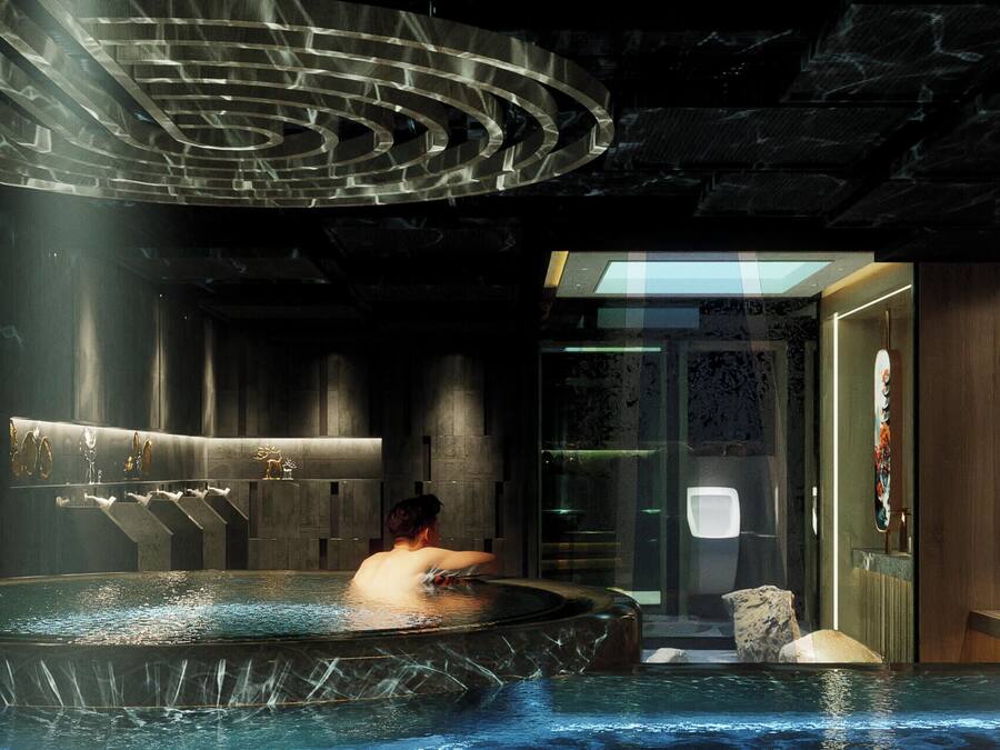 Un área de spa con hidromasaje, paredes de mármol y un diseño de techo moderno.