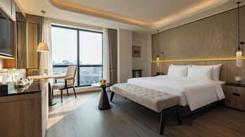 Premium bedding, memory foam beds, minibar, in-room safe