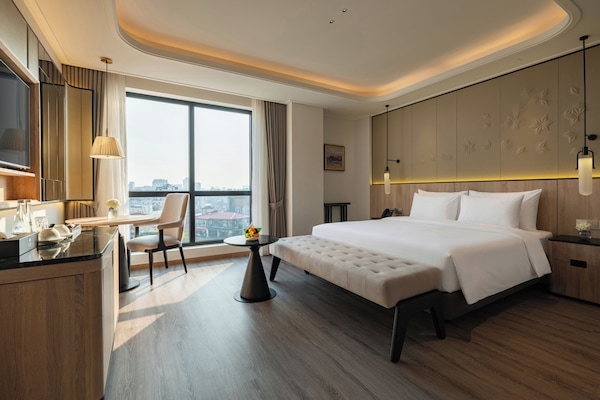 Premium bedding, memory-foam beds, minibar, in-room safe