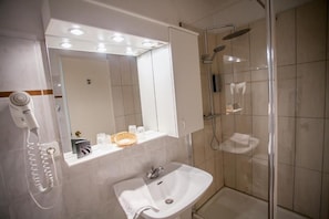 Hair dryer, soap, shampoo, toilet paper