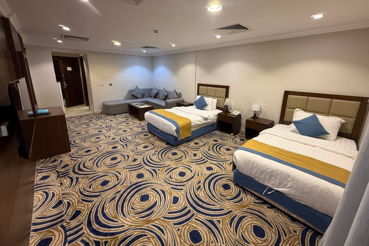 Chambre Deluxe avec lits jumeaux | Coffre-fort, système d’insonorisation, accès au Wi-Fi (inclus)