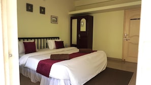 Family Room, Balcony, Garden View | Desk, laptop workspace, bed sheets