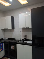 Exclusive Apartment, Non Smoking | Private kitchen | Full-size fridge, microwave, oven, dishwasher