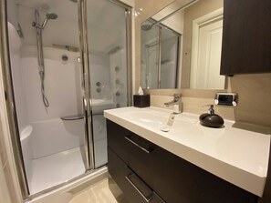 Shower, jetted tub, hair dryer, bidet