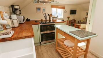 Fridge, microwave, toaster, cookware/dishes/utensils