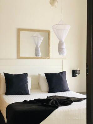 Standard Apartment, 2 Bedrooms, Balcony, Courtyard View | Premium bedding, down comforters, minibar, in-room safe - Rosewood place Lodge (Kitwe)