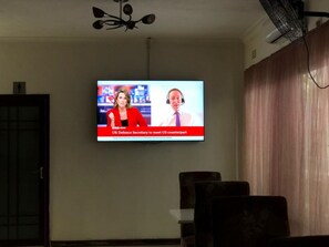 Deluxe Double Room, Balcony, Courtyard View | Television