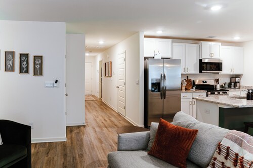 Modern 3BR near UA with King Bed, Fire Pit, and Private Primary Bedroom and Bath.