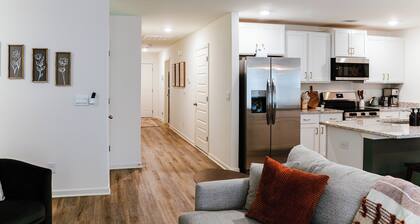 Modern 3BR near UA with King Bed, Fire Pit, and Private Primary Bedroom and Bath.