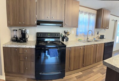 Encantadora y relagante casa rodeada de pinos con 4 cuartos.