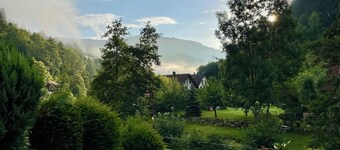 Ferienhaus Oesterle - Idyllic Black Forest house by a stream with terrace & balcony