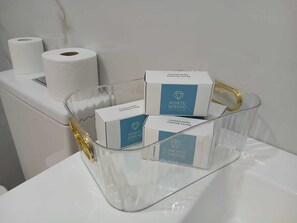 Shower, hair dryer, towels, soap