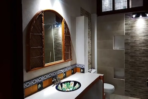 Shower, towels, soap, toilet paper