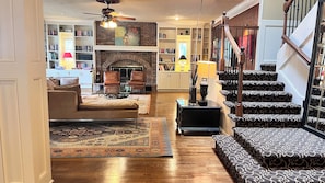 Smart TV, fireplace, books