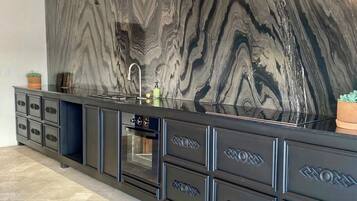 Luxury Apartment, Balcony, Mountain View | Private kitchen | Full-size fridge, stovetop, cookware/dishes/utensils