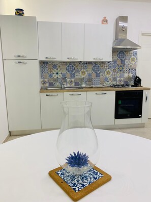 Comfort Apartment | Private kitchen | Fridge, microwave, cookware/dishes/utensils