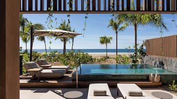 Penthouse, 1 cama King size y sofá cama, para no fumadores | Alberca | 2 albercas al aire libre y camas balinesas (con cargo)