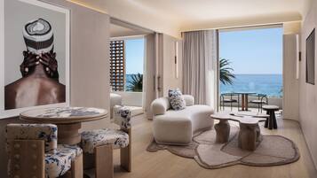 Signature Room, 1 Bedroom | Living area | 55-inch Smart TV with cable channels