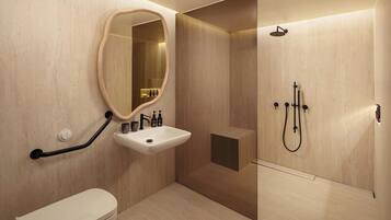 A modern bathroom with a toilet, sink, mirror, and shower.