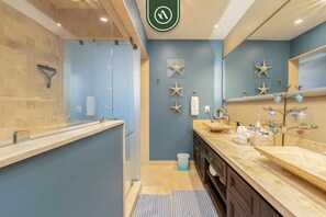 Shower, hair dryer, towels