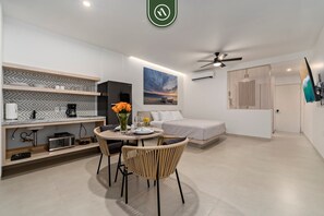 1 bedroom, desk, iron/ironing board, travel crib