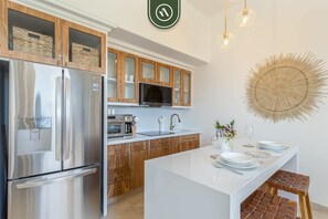 Fridge, microwave, stovetop, coffee/tea maker