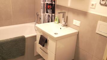 Hair dryer, towels, soap, toilet paper