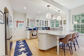 Fridge, microwave, oven, stovetop - Newly Remodeled Lakeview Home w/ screened porch, gas grill, & 300ft from beach (Lakeside)