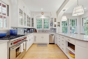 Fridge, microwave, oven, stovetop - Newly Remodeled Lakeview Home w/ screened porch, gas grill, & 300ft from beach (Lakeside)