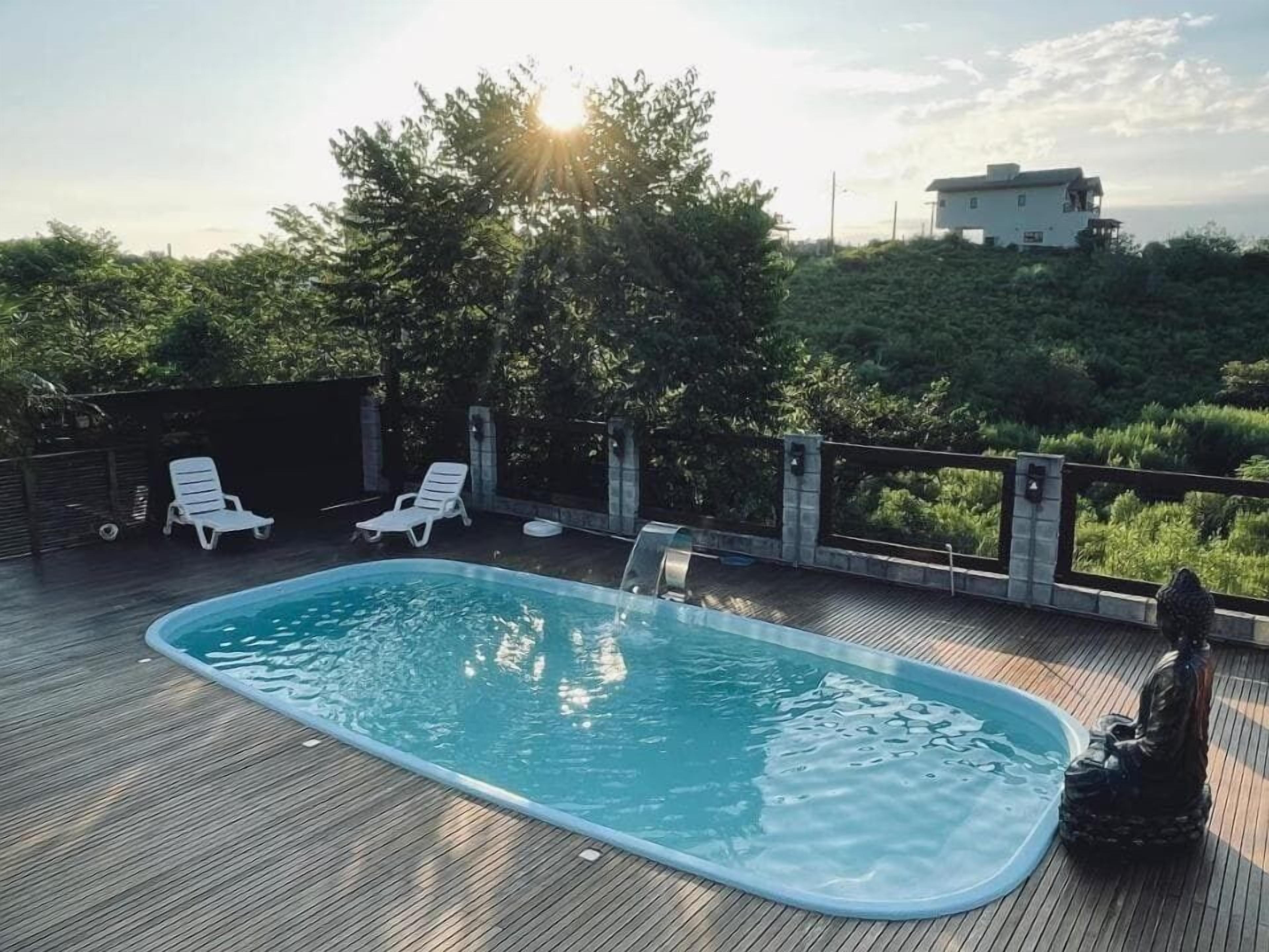 Outdoor pool, open 8:00 AM to 10:00 PM, sun loungers