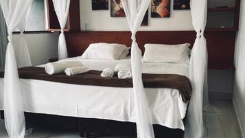 Desk, laptop workspace, free WiFi, bed sheets