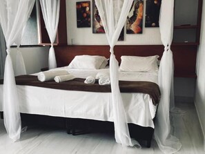 Desk, laptop workspace, free WiFi, bed sheets