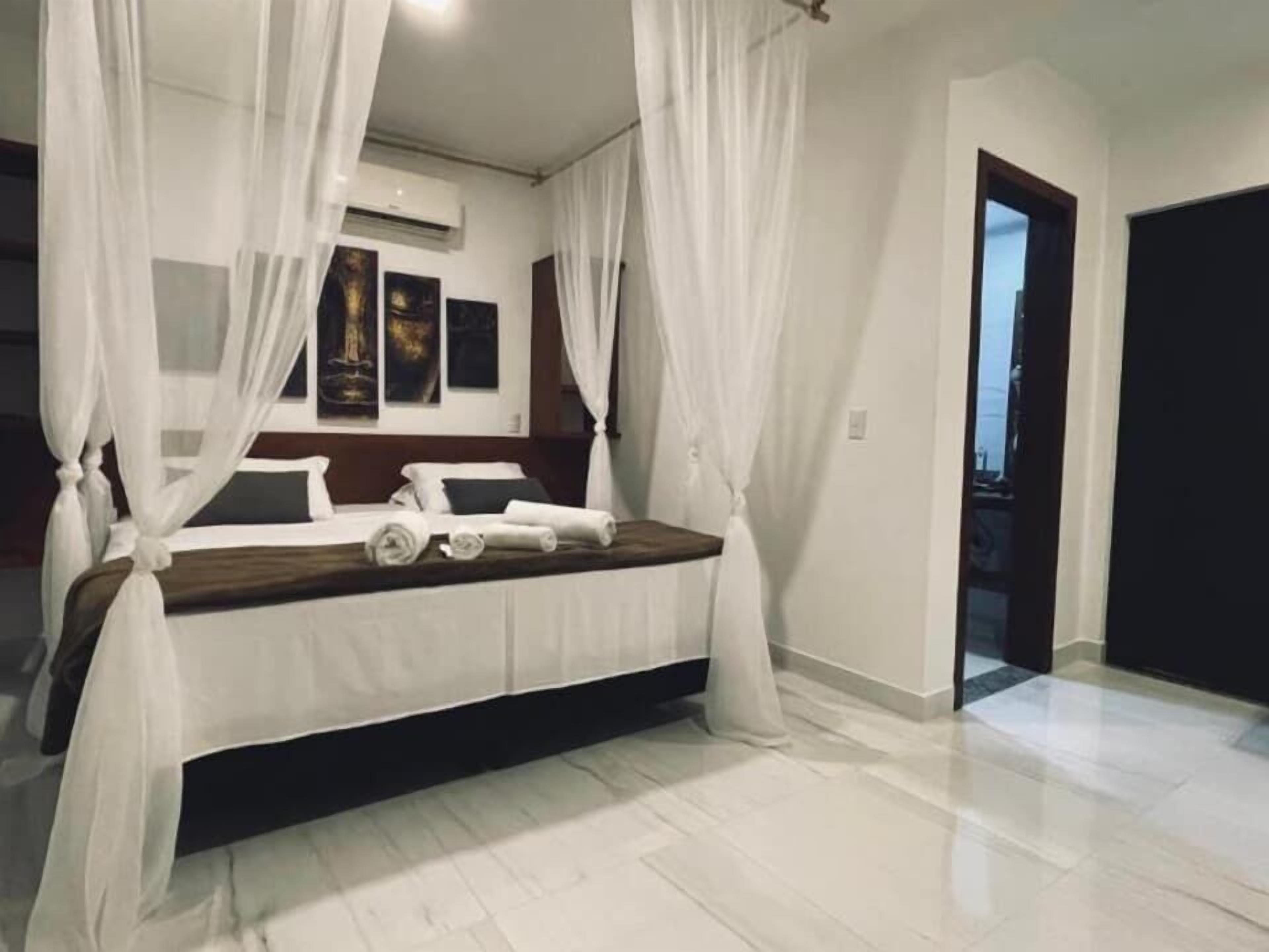 Desk, laptop workspace, free WiFi, bed sheets