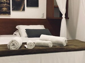 Desk, laptop workspace, free WiFi, bed sheets