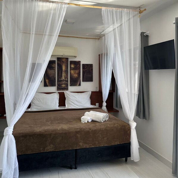 Desk, laptop workspace, free WiFi, bed sheets