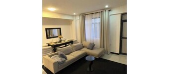 Three-Bedroom Apartment with Balcony 1