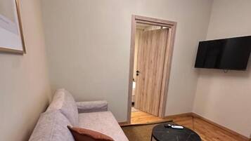 Deluxe Apartment, Balcony, Courtyard View | Living area