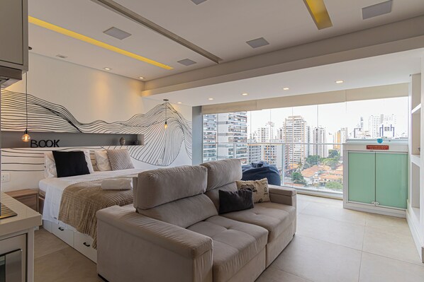 1 bedroom, desk, iron/ironing board, travel crib